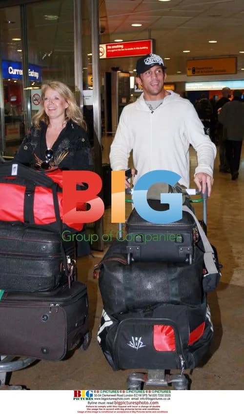 Alex Reid arrives in London from LA