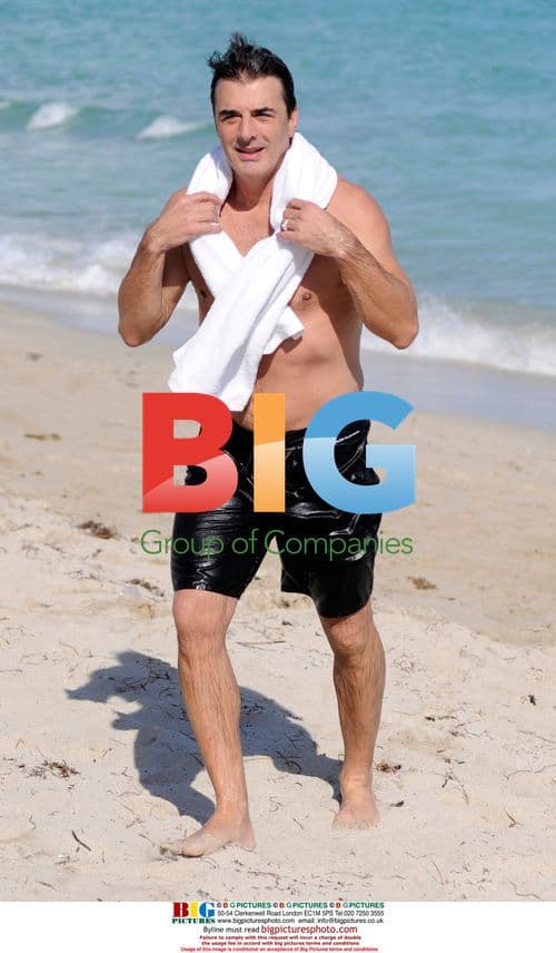 Chris Noth swimming on Miami Beach