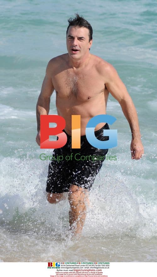 Chris Noth swimming on Miami Beach