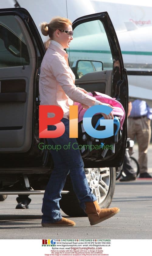 Katherine Heigl and Josh Kelley depart LAX with family