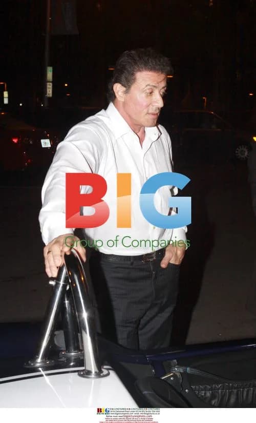 Sylvester Stallone checks out antique car in Miami