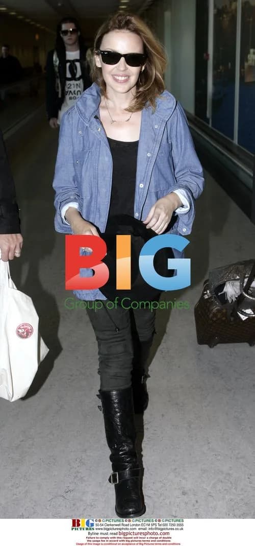Kylie Minogue arrives at Heathrow from New York