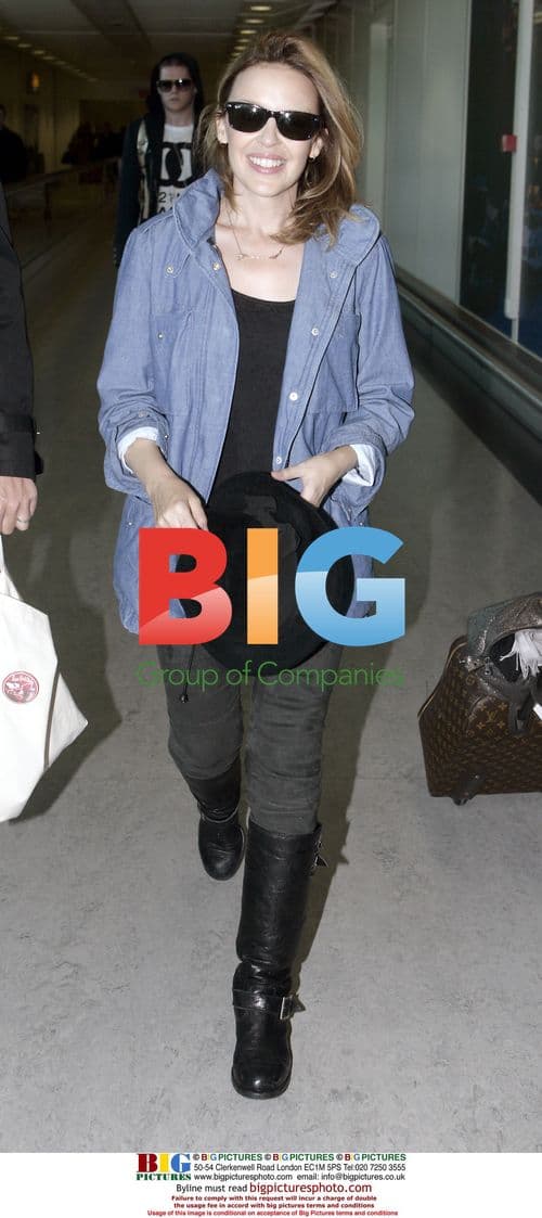 Kylie Minogue arrives at Heathrow from New York