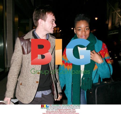 Rikki Loney and Rachel Adedeji Walk Hand in Hand in London