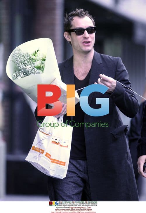 Jude Law at birthday party with Sienna Miller