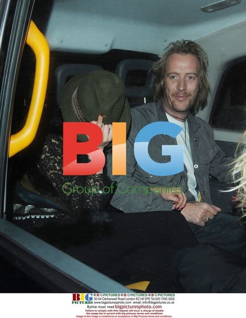Rhys Ifans and Kimberley Stewart leaving Hilton