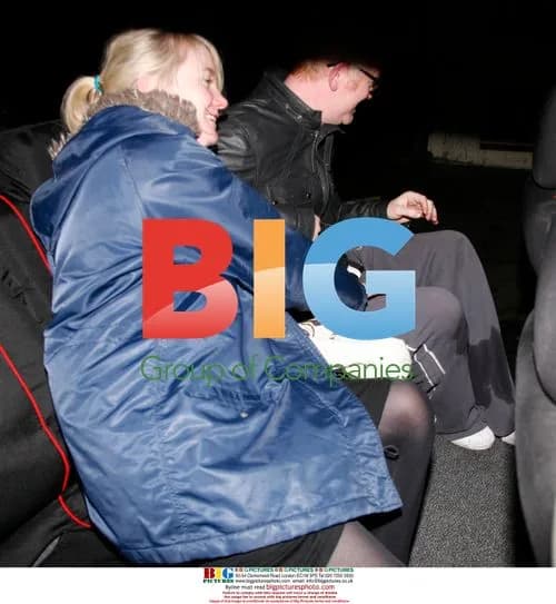 Chris Evans and mystery woman at Christmas party
