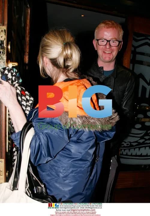 Chris Evans and mystery woman at Christmas party
