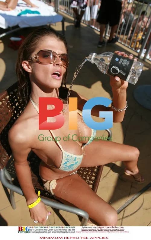 Joslyn James poses poolside