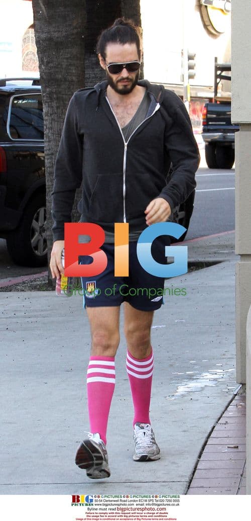 Russell Brand hits the gym in West Ham shorts