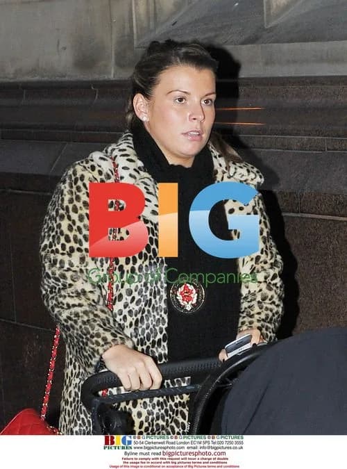Coleen Rooney out with son Kai in Liverpool