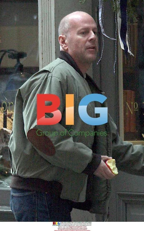 Bruce Willis eats apple in NYC
