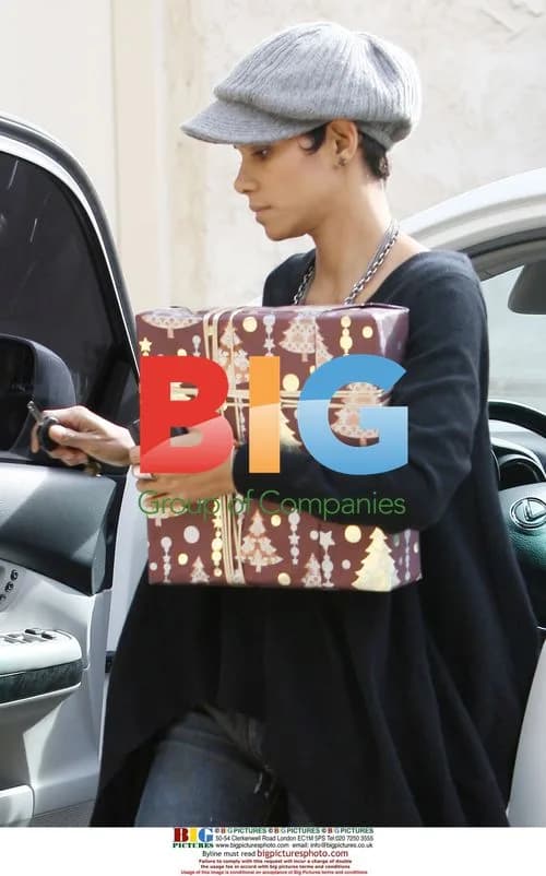 Halle Berry carries Christmas gift