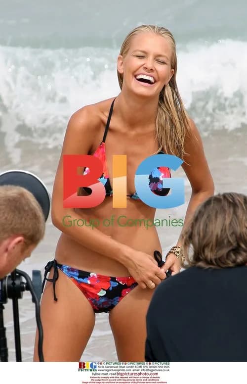 Lara Bingle Poses for Sexy Beach Photoshoot
