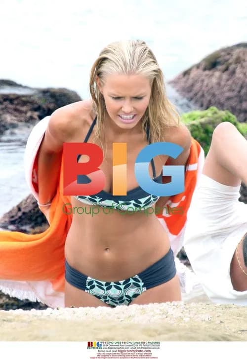 Lara Bingle Poses for Beach Photoshoot