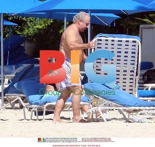 Sir Philip Green Relaxing on Barbados Beach