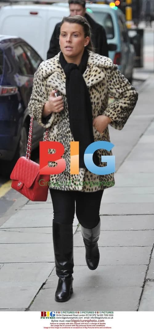 Coleen Rooney Out Shopping with Baby Kai