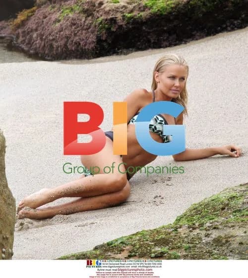 Lara Bingle Poses for Beach Photoshoot