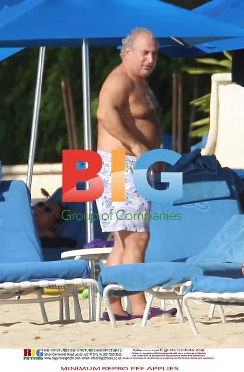 Sir Philip Green relaxing in Barbados