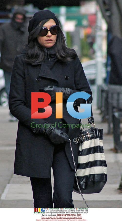 Famke Janssen Walks Dog in NYC