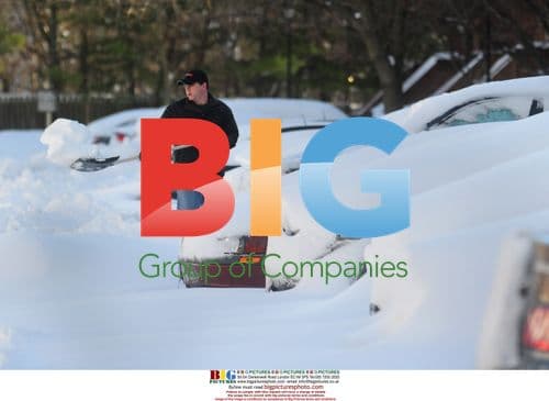 Man shovels snow in Washington after blizzard