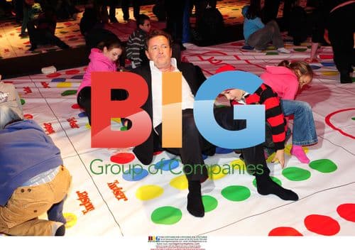 Piers Morgan plays Twister in London