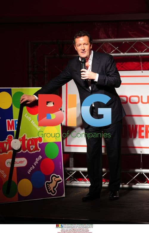 Piers Morgan plays Twister in London