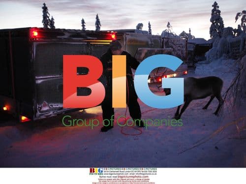 Editorial photo of Laplanders and reindeers in Sweden