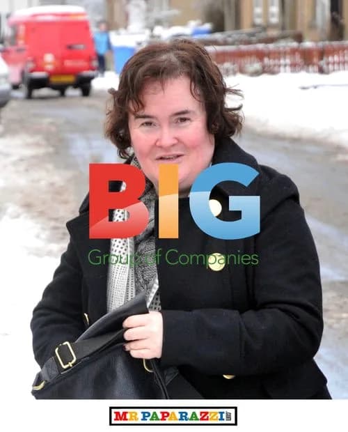 Susan Boyle Plays in the Snow