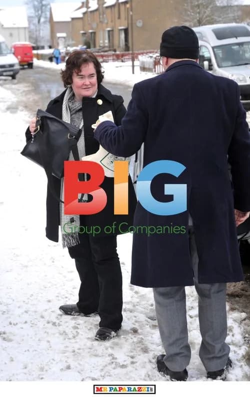 Susan Boyle Plays in the Snow