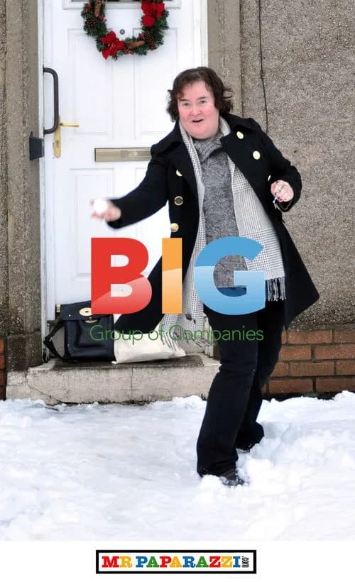 Susan Boyle Plays in the Snow