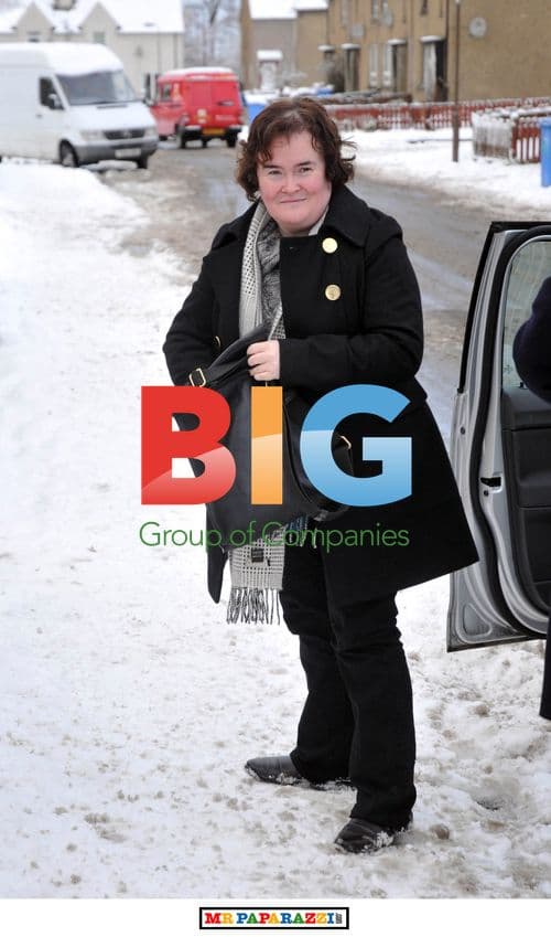 Susan Boyle Plays in the Snow