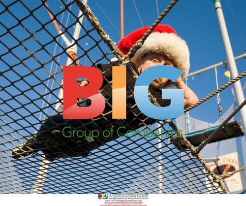 Verne Troyer in Santa hat after trapeze jump