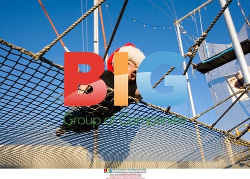 Verne Troyer in Santa hat after trapeze jump