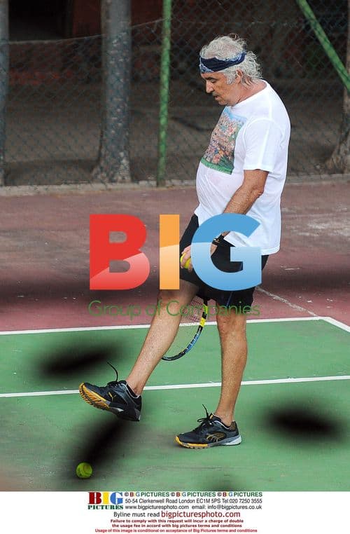 Flavio Briatore plays tennis in Maldives