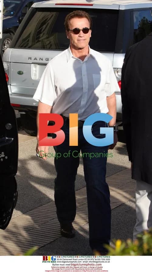 Arnold Schwarzenegger leaves Barney's in Beverly Hills
