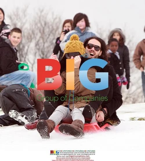 Russell Brand and Katy Perry sled in London