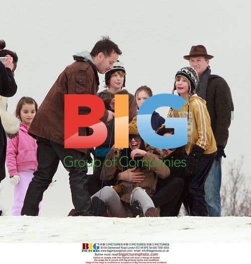 Russell Brand and Katy Perry sledding in London