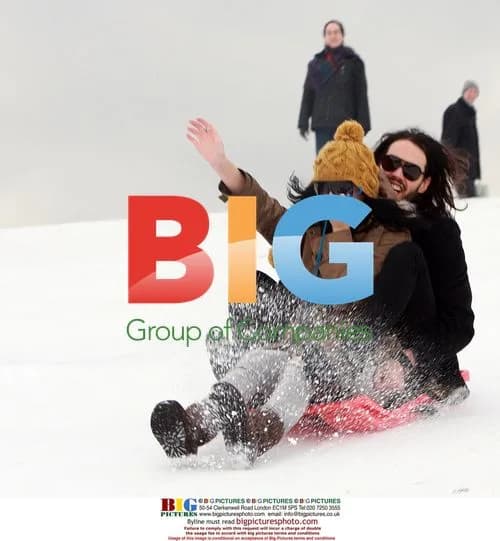 Russell Brand and Katy Perry go sledding