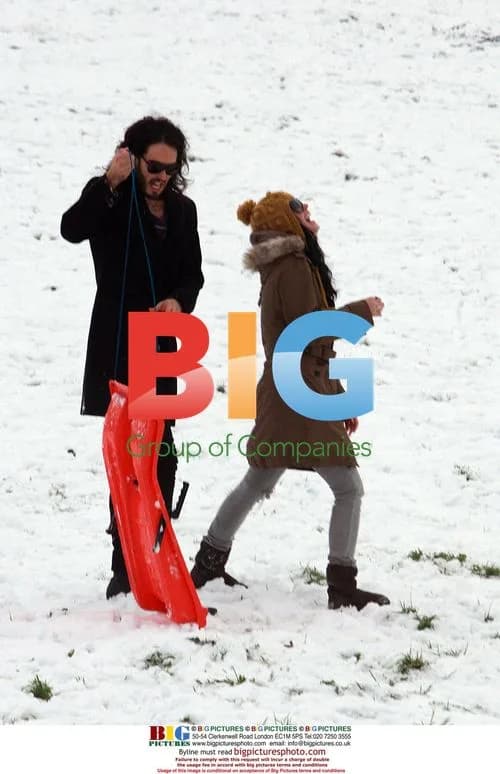 Russell Brand and Katy Perry go sledding in London