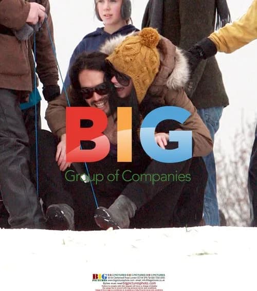 Russell Brand and Katy Perry go sledding in London