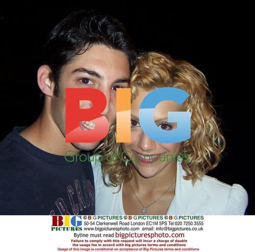 Brittany Murphy poses with fan in Central Park