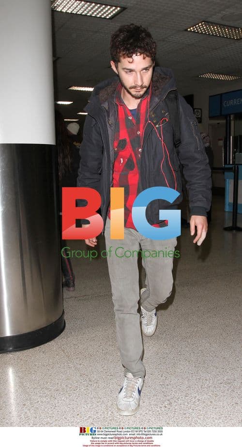 Shia Labeouf Arrives at LAX with Bandaged Finger
