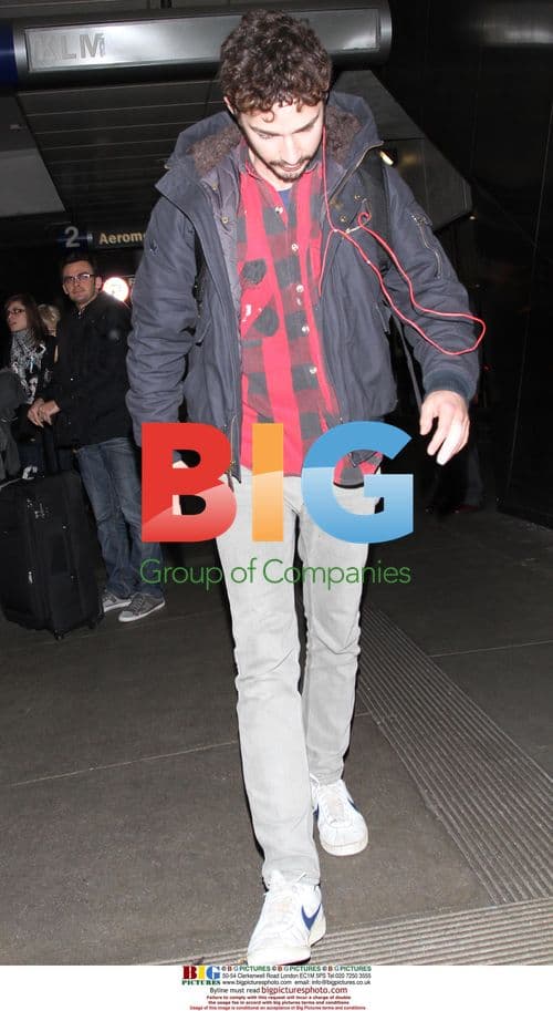 Shia Labeouf arrives at LAX with bandaged finger