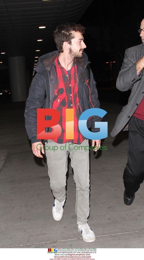 Shia Labeouf arrives at LAX with bandaged finger