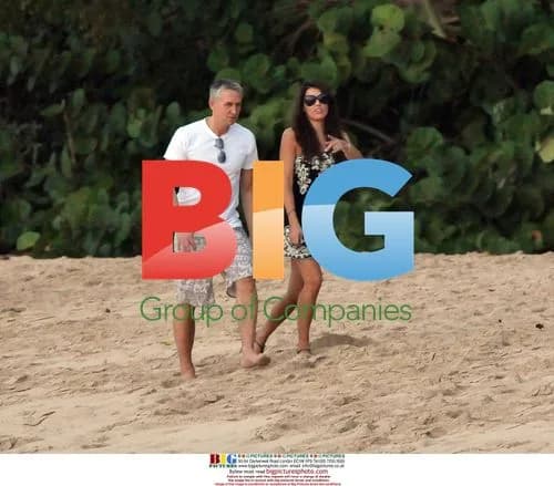 Gary Lineker and Danielle Bux on the beach