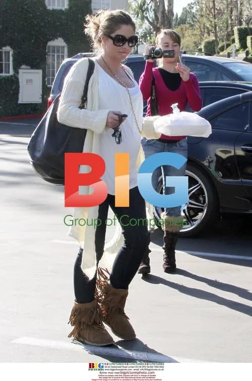 Rebecca Gayheart shows off baby bump in LA