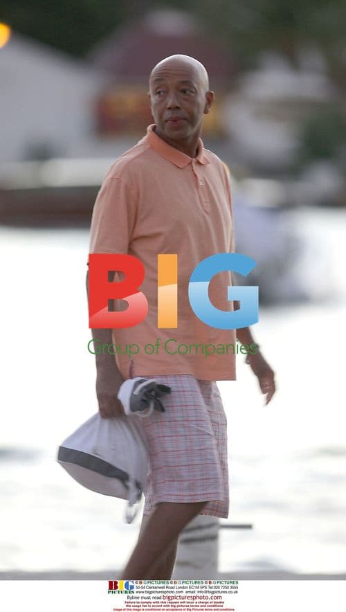 Russell Simmons enjoys boat trip with mystery woman