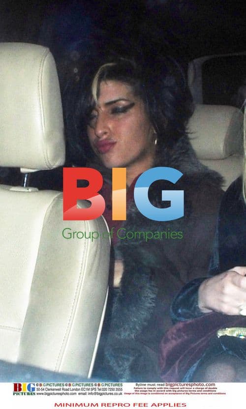 Amy Winehouse and friend leave Hawley Arms pub