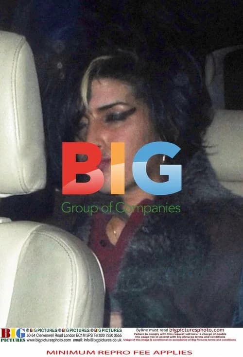 Amy Winehouse Leaves Pub in Camden